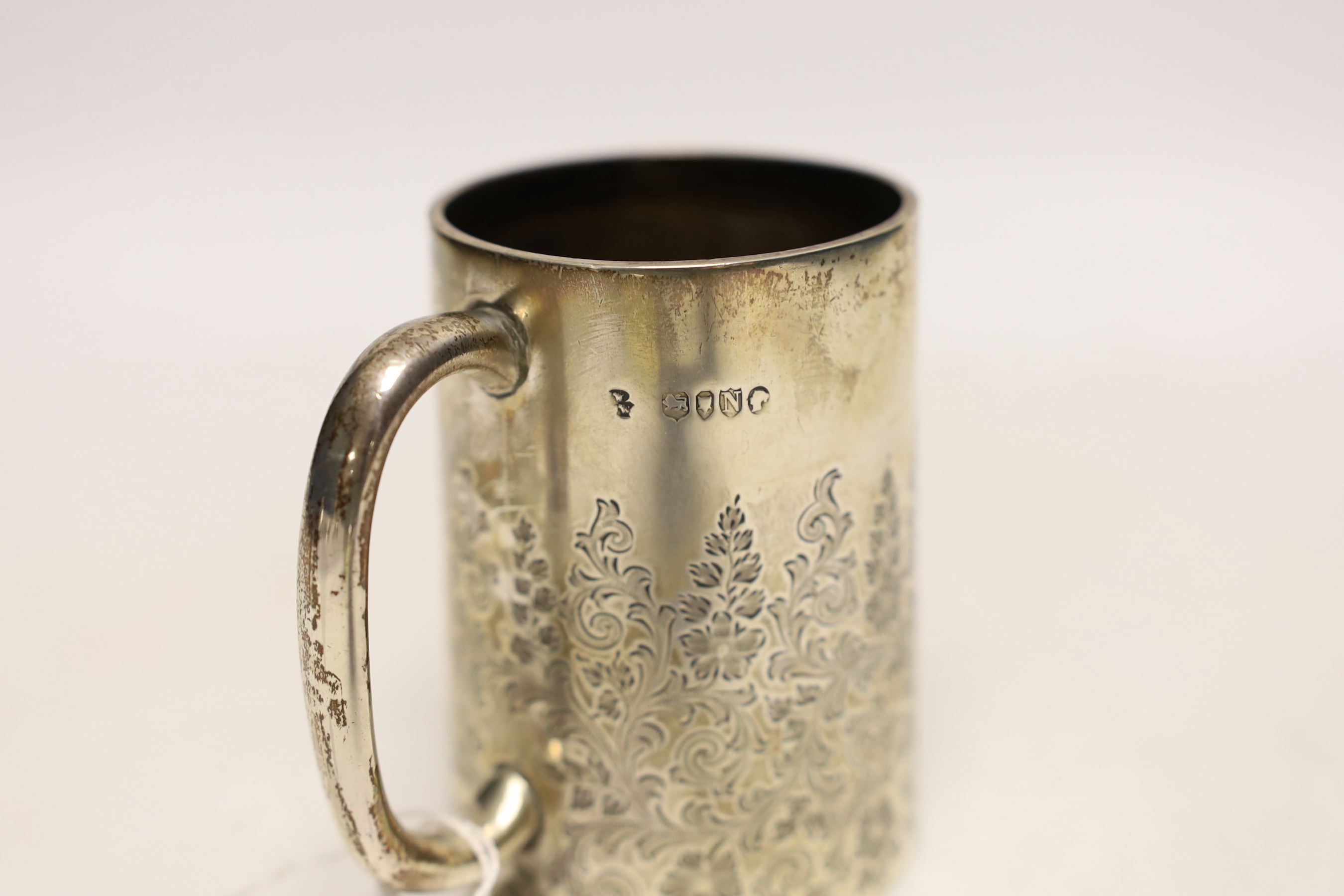 A Victorian engraved silver christening mug, maker's mark rubbed, London, 1888, 89mm, 145 grams.